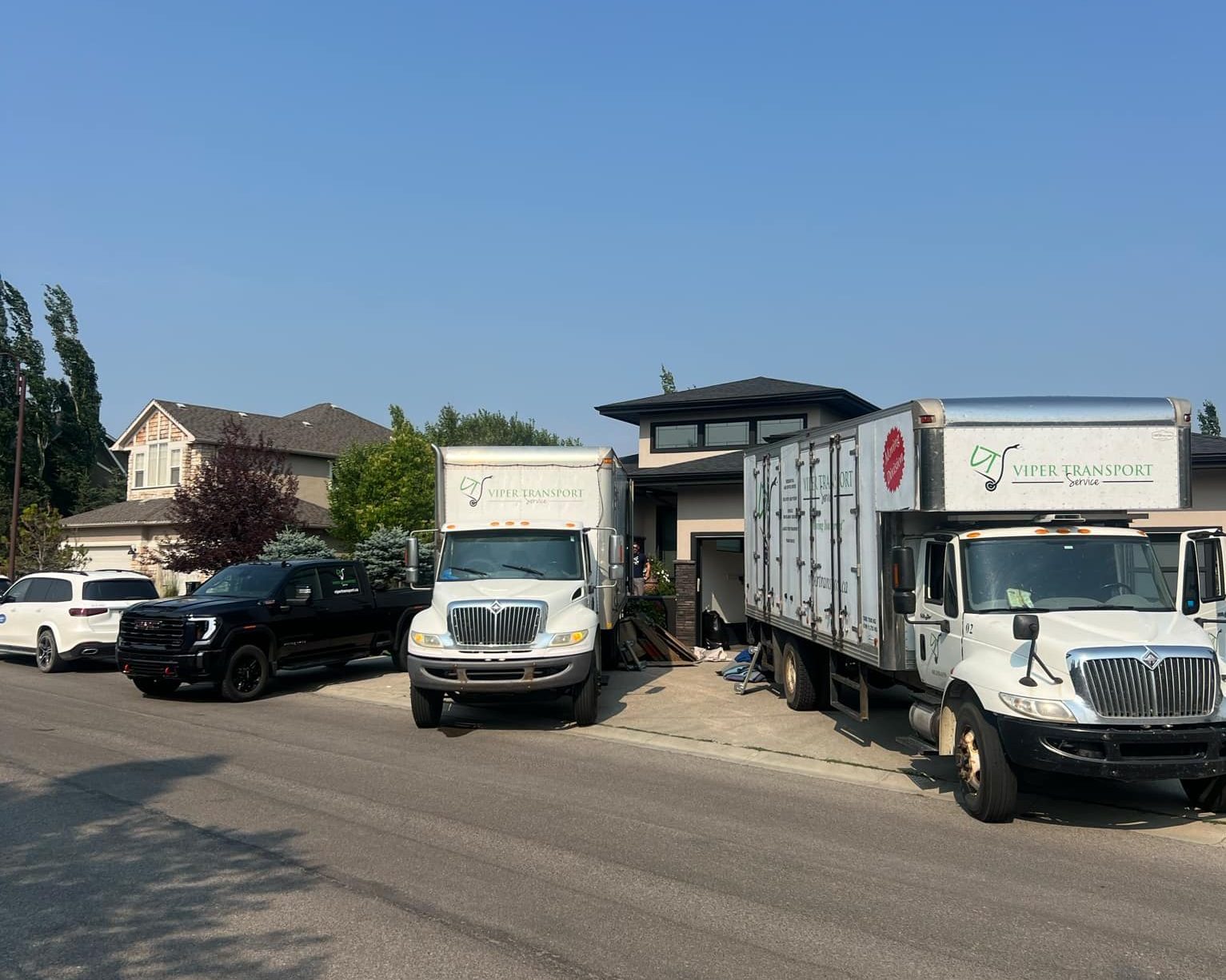 Show the fleet of residential moving trucks for Viper Transport